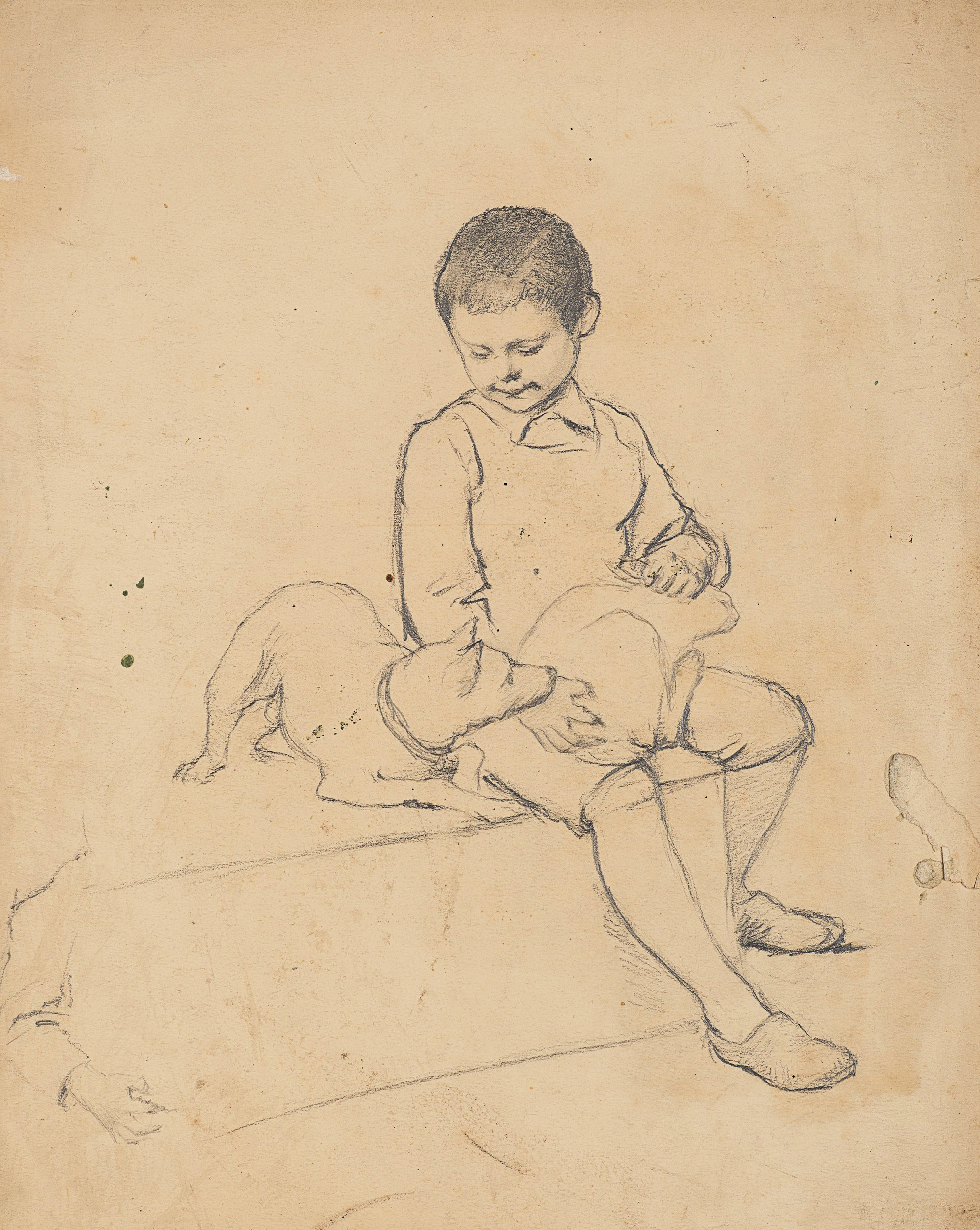 Knabe mit Hund auf dem Schoß