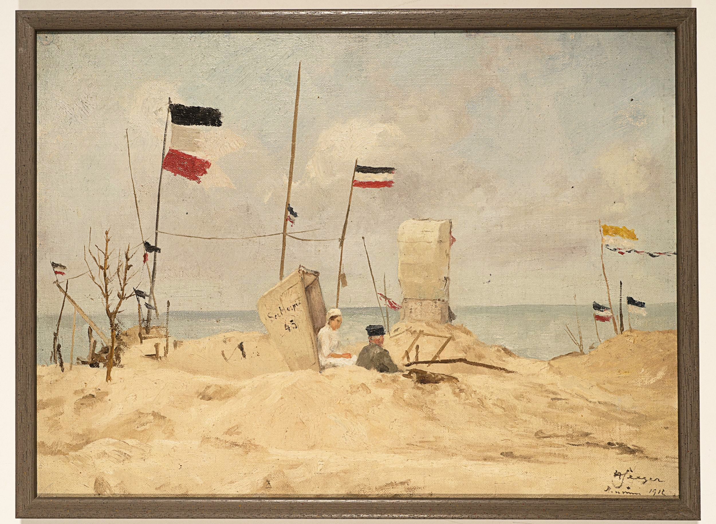 Strandszene mit Kaiserfahnen an der Nordsee