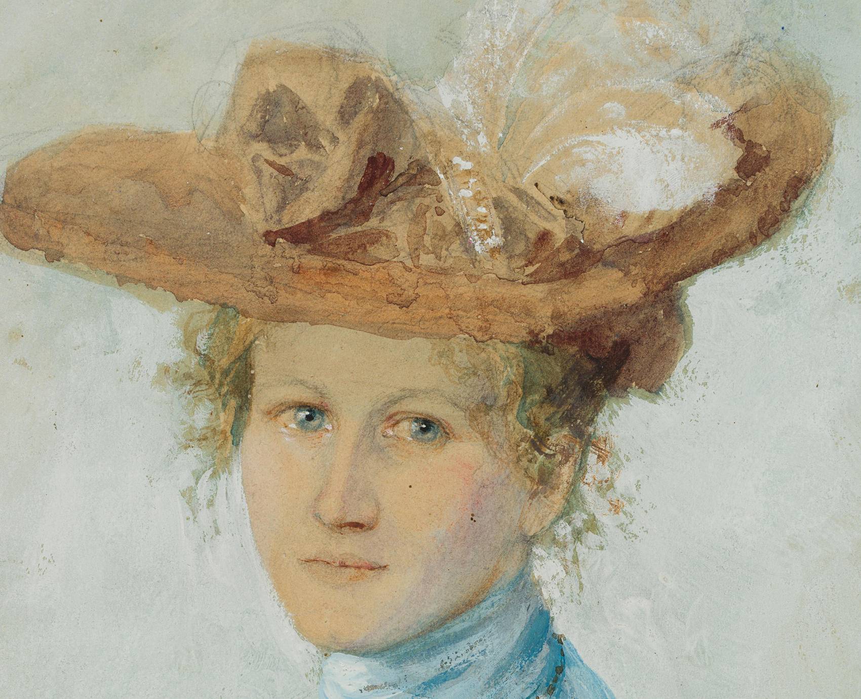 Junge Frau mit Federhut