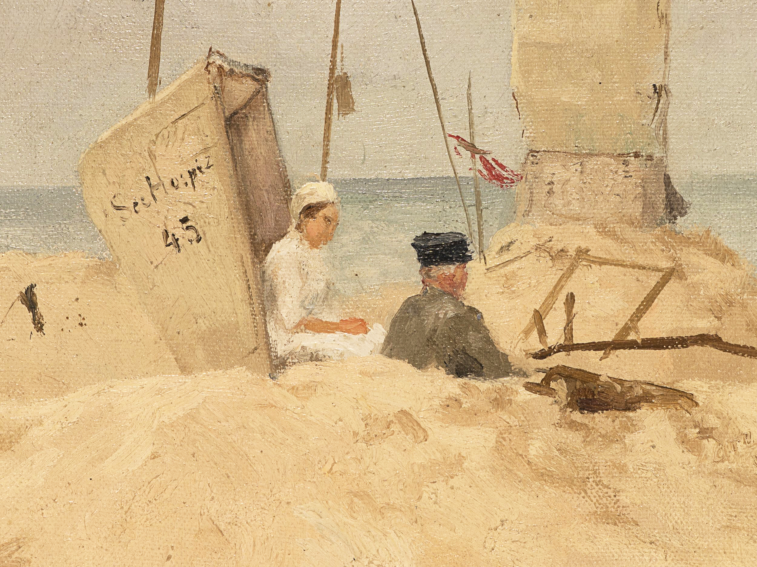 Strandszene mit Kaiserfahnen an der Nordsee